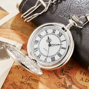 Detailed close-up of a vintage silver flip pocket watch with Roman numerals and quartz movement