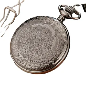 Classic vintage engraved pocket watch with floral pattern lid and metallic chain