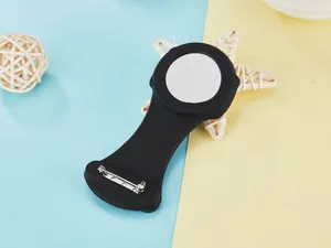 Back view detail of black silicone digital nurse watch featuring secure metal safety pin