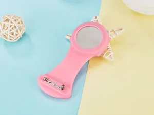 Back view of pink silicone nurse watch with safety pin for uniform attachment