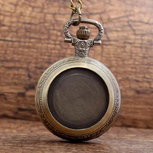 Detailed macro shot of vintage bronze DIY pocket watch featuring ornate engraved border
