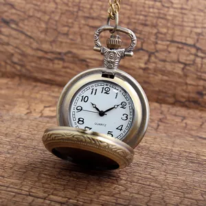 Macro detail of a vintage bronze pocket watch featuring a classic quartz movement dial