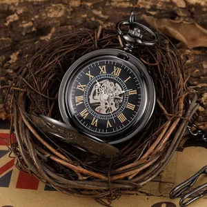 Vintage black mechanical skeleton pocket watch with Roman numerals in a decorative bird nest