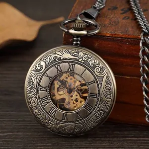 Close-up of vintage bronze mechanical skeleton pocket watch with Roman numerals