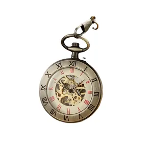 Reloj de bolsillo mecánico de esqueleto en bronce antiguo con cuerda manual y números romanos