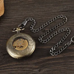 Detailed view of vintage bronze automatic mechanical pocket watch with ornate engravings