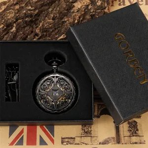 Vintage mechanical pocket watch with hollow floral carving in elegant gift box