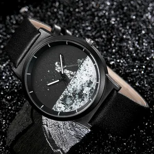 Close-up of minimalist quartz watch featuring creative astronaut on the moon dial