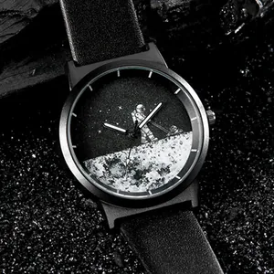 Close-up showing the intricate astronaut and moon surface texture on the watch dial