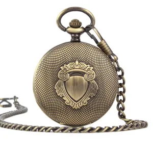 Vintage bronze automatic mechanical pocket watch with textured shield flip cover and chain.