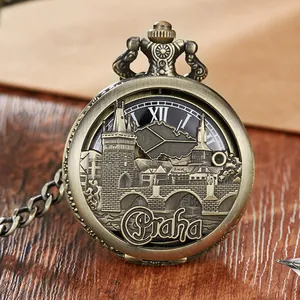 Detailed view of a vintage bronze mechanical pocket watch with Praha skyline engraving