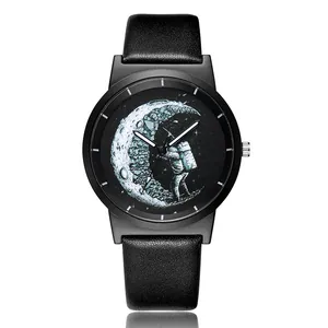 Close-up detail of a minimalist quartz watch with astronaut and moon dial artwork