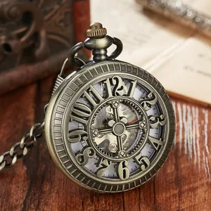 Detailed view of a vintage bronze mechanical pocket watch with hollow carved numerals