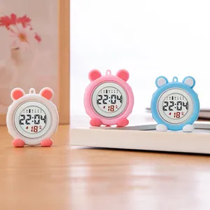 Silicone nurse fob watches with cartoon bear ear design in pink and blue colors.