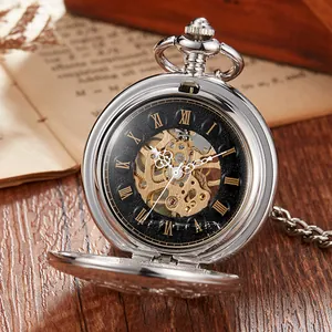Detailed close-up of a silver skeleton mechanical pocket watch with Roman numerals