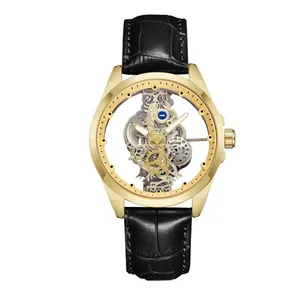 Detailed macro view of gold skeleton automatic watch with black crocodile leather strap