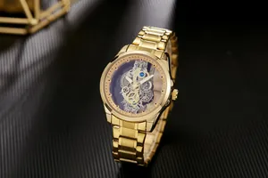 Luxury gold skeleton men's watch detail featuring intricate automatic movement gears.