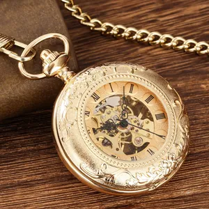 Detailed view of vintage gold hollow mechanical pocket watch with Roman numerals