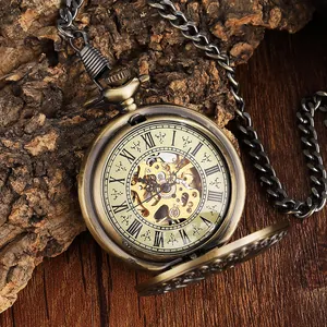 Detailed close-up of a vintage bronze skeleton mechanical pocket watch with roman numerals