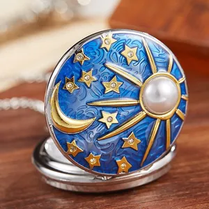 Vintage kwarts zakhorloge met blauw emaille hemel, sterren, maan en parelmoer zon