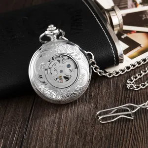Classic silver vintage mechanical pocket watch with ornate floral carving