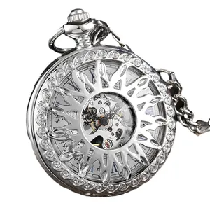 Vintage silver mechanical pocket watch featuring a sunburst hollow design and Roman numerals