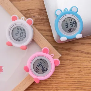Close-up of cute cartoon silicone nurse watches in blue, pink, and white variants