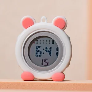 Close-up of cute cartoon bear digital nurse watch in white and pink silicone