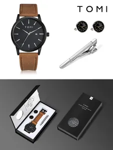 Coffret cadeau montre minimaliste TOMI avec montre en cuir, boutons de manchette et pince.
