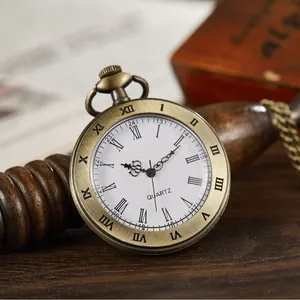Vintage bronze open face quartz pocket watch with white dial and classic Roman numerals