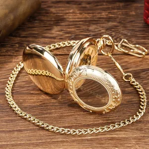 Detailed macro shot of vintage gold pocket watch featuring intricate floral engravings on cover.