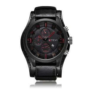 Close-up showing the intricate red dial details and textured black leather strap