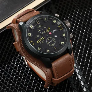 Detailed view of a men's military-style sports watch with a wide brown leather strap