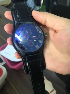 Detailed macro shot of TEVISE large dial military sports watch with black leather strap
