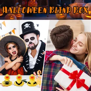 Set of Halloween themed rubber ducks shown in a festive blind box advent gift scene