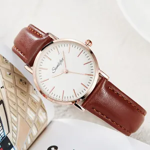 Detail shot of Sunlifex quartz watch featuring a brown leather strap and rose gold case