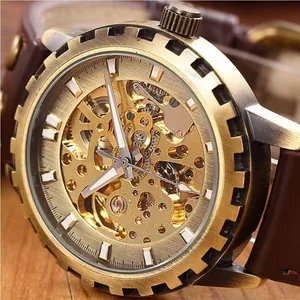 Close-up of vintage bronze skeleton mechanical watch with gear-shaped bezel detail