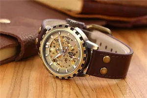 Vintage bronze gear-bezel skeleton automatic mechanical watch with brown leather rivet strap