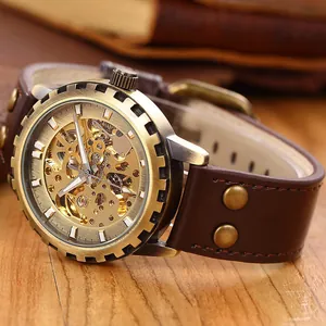 Detailed macro view of vintage steampunk bronze gear automatic watch with skeleton dial