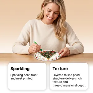 Detailed view of DIY Christmas pearl art painting featuring sparkling layered texture and pen