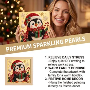 Close-up showing sparkling pearls on a festive Christmas penguin DIY painting art kit
