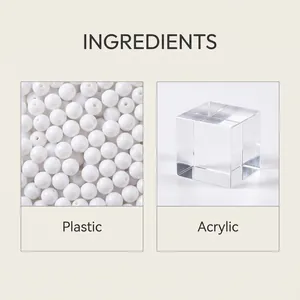 Close-up detail showing plastic pearls and clear acrylic cube ingredients