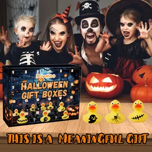Detailed view of Dowmoo Halloween advent calendar box and three themed rubber ducks