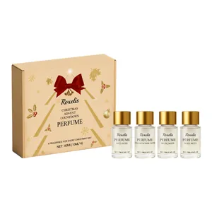 Luxury Christmas advent countdown perfume gift set with four scents in gold box