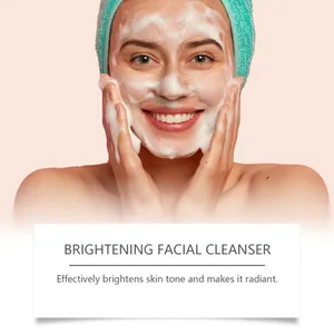 Woman cleansing face with turmeric foaming cleanser