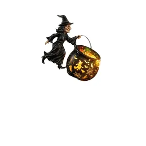 Lampe de jardin sorcière d'Halloween avec chaudron lumineux aux motifs de chauve-souris