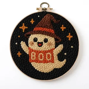 Detailed close-up of a handmade Halloween ghost punch needle embroidery in a wooden hoop
