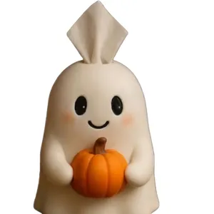Halloween ghost tissue box cover holding a pumpkin, cute festive party table decoration