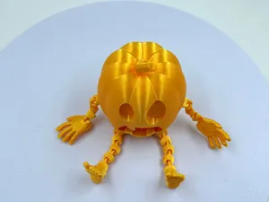 Bewegliches 3D-gedrucktes Halloween-Kürbis-Monster Spielzeug mit Gelenken in hellem Orange