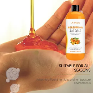 Close-up of amber liquid texture pouring into hand for persimmon body wash